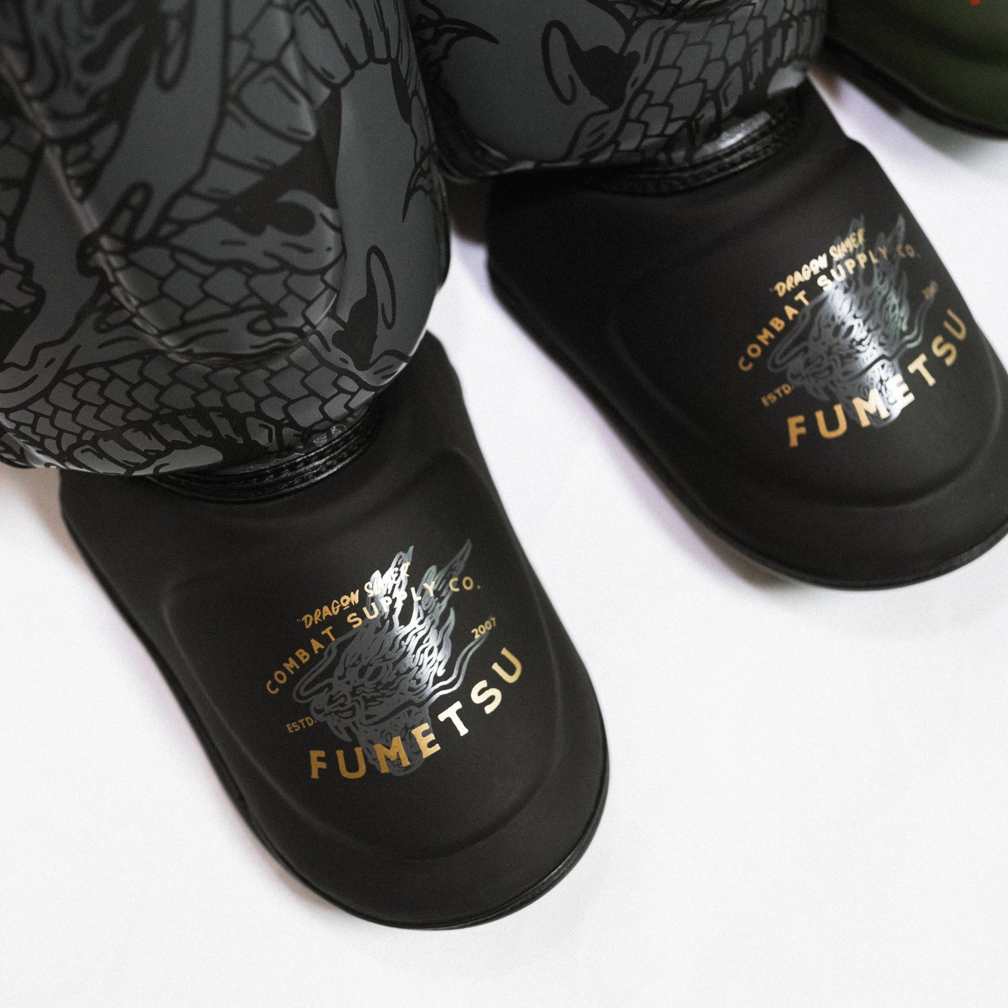 Dragon Slayer Shin Guards Black Gold Close Up