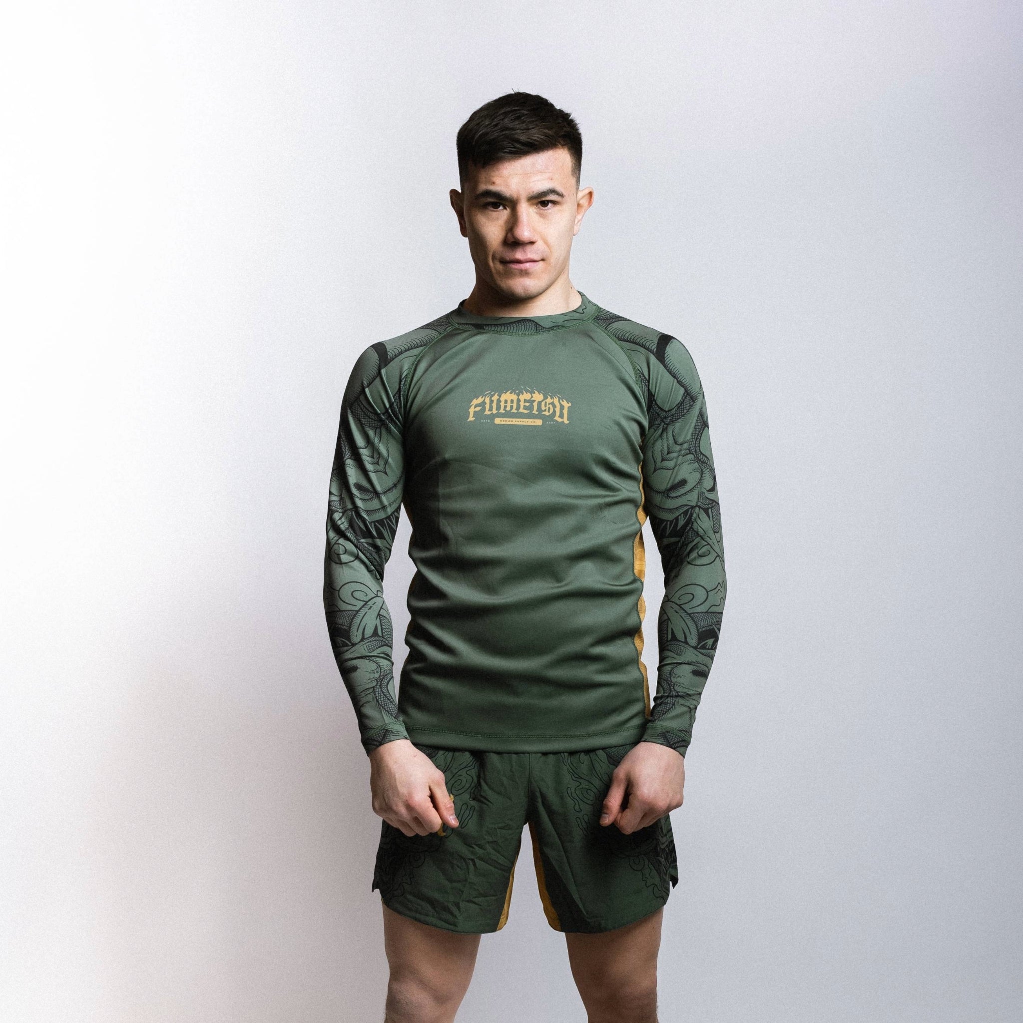Oni Long Sleeve Rash Guard Khaki/Gold/Black Photo Shoot