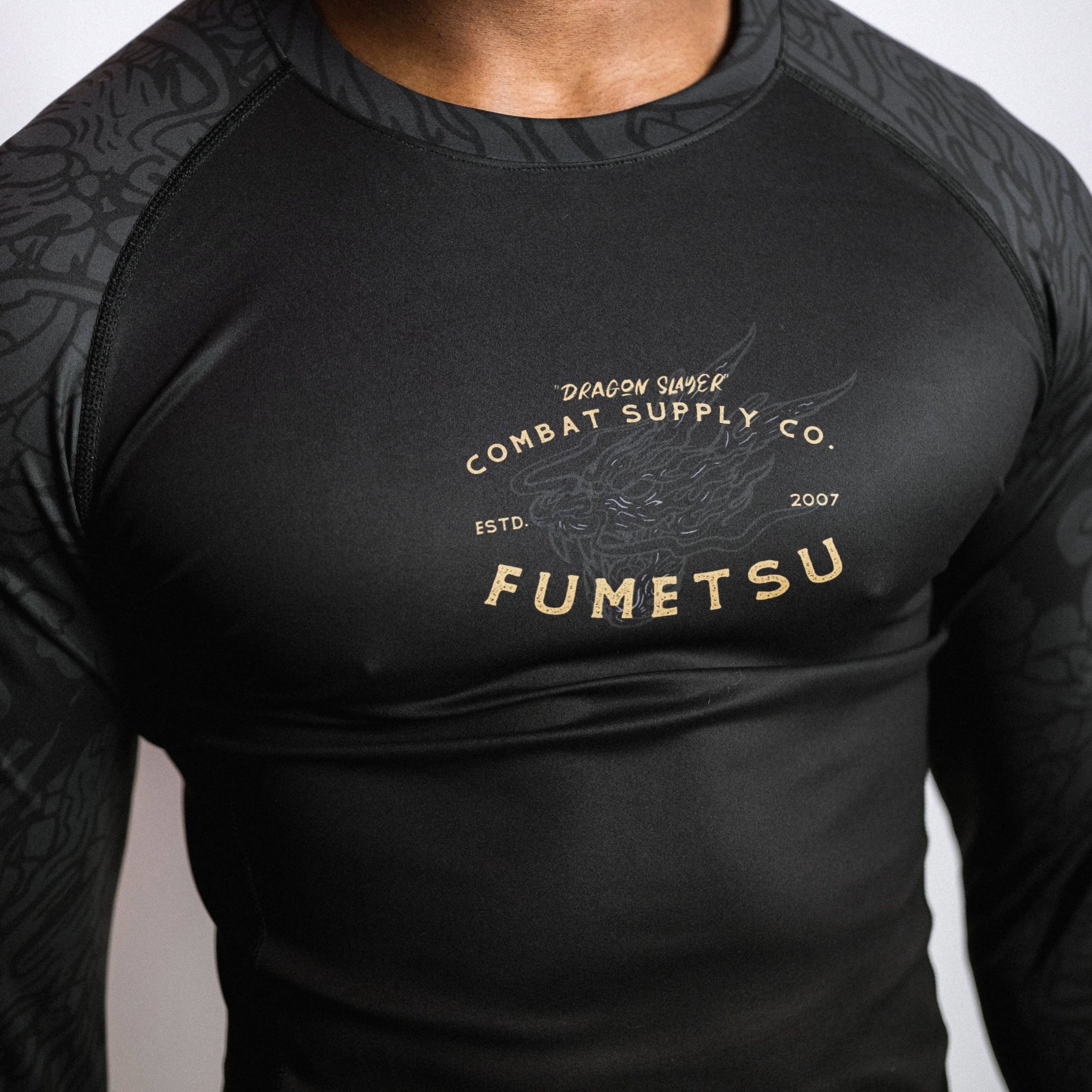 Dragon Slayer Long Sleeve Rash Guard Black/Gold Close Up