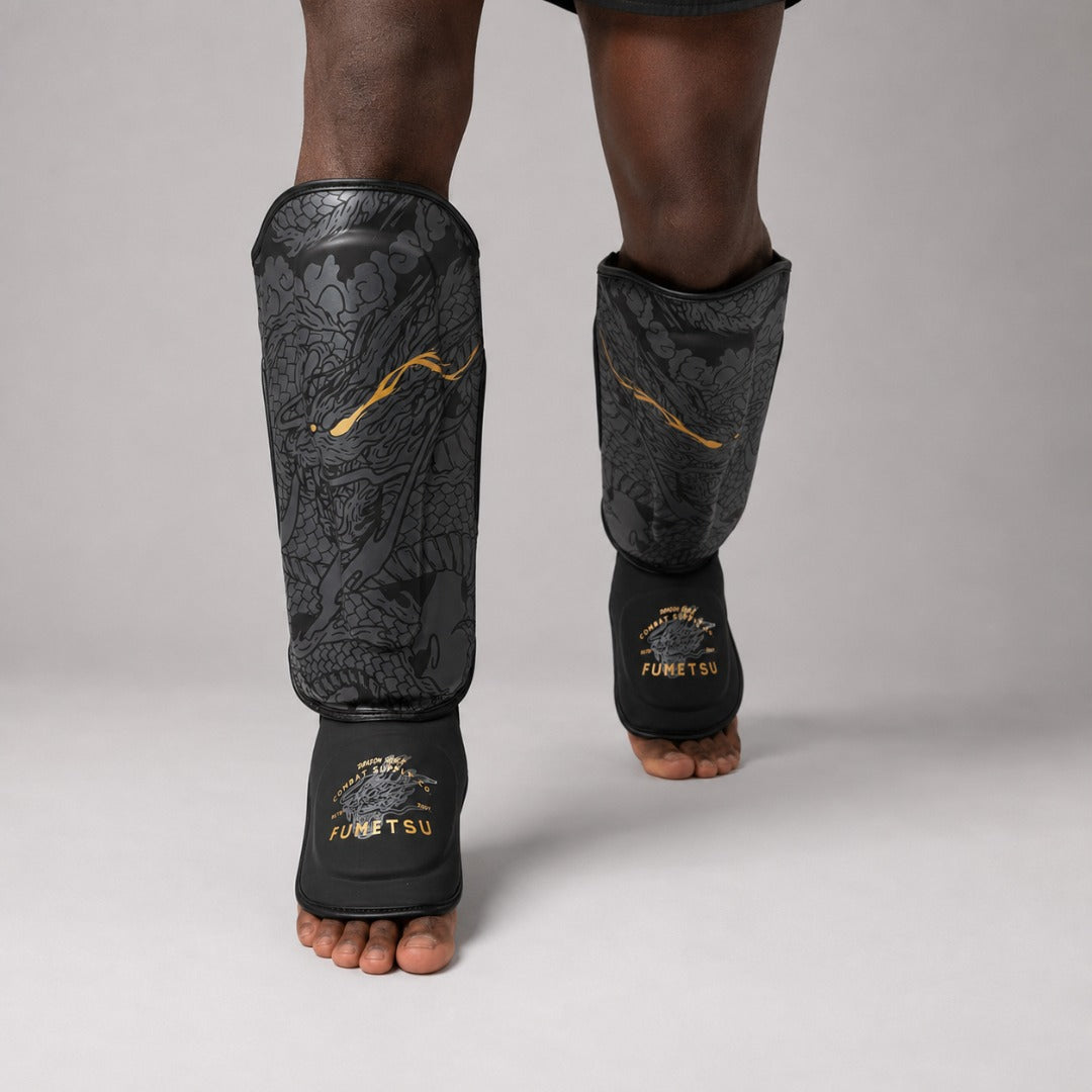 Dragon Slayer Shin Guards Black/Gold