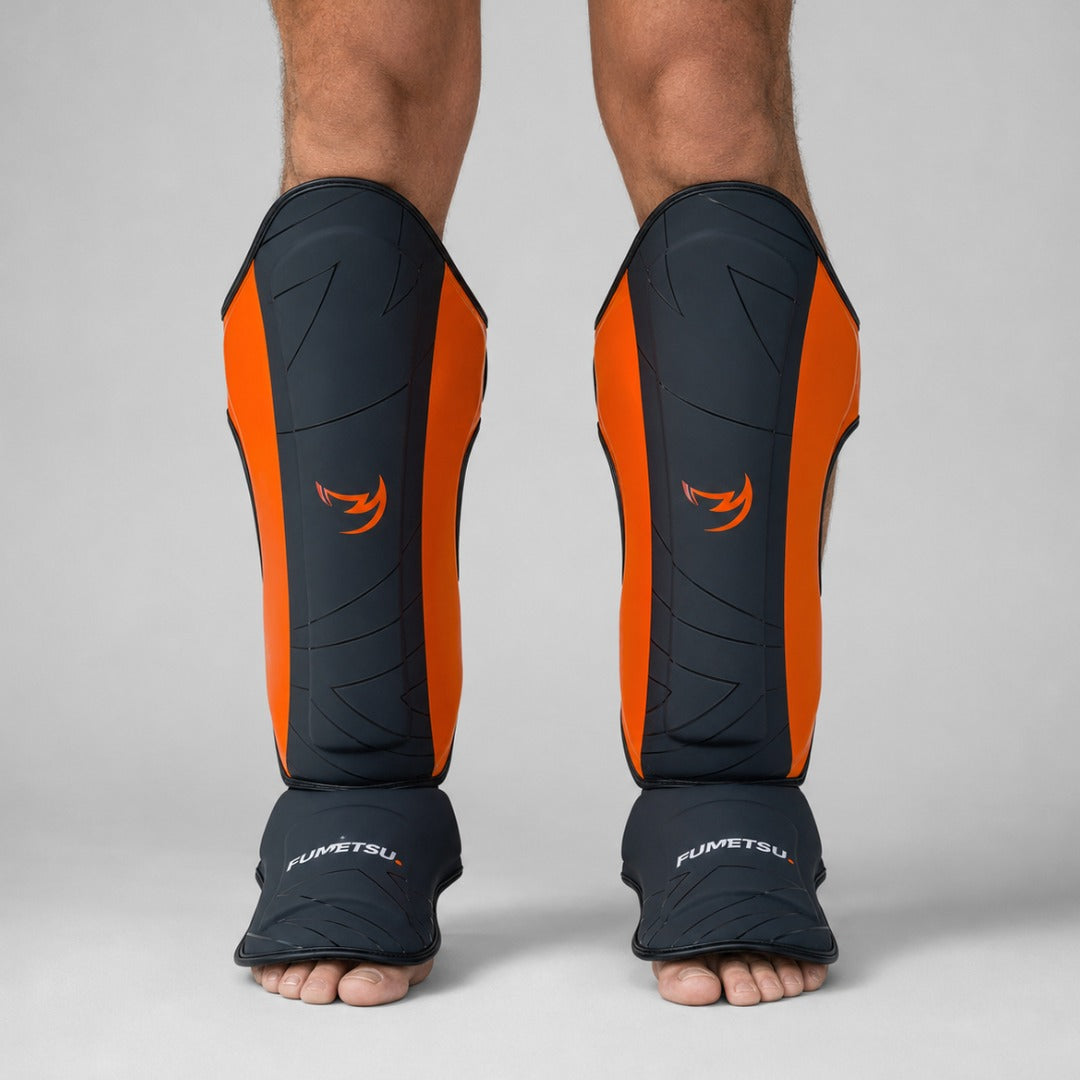 Icon Thai Shin Guards Black/Orange Lifestyle 1