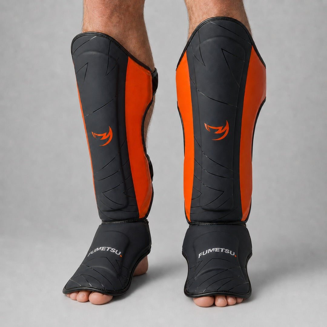 Icon Thai Shin Guards Black/Orange Lifestyle 2