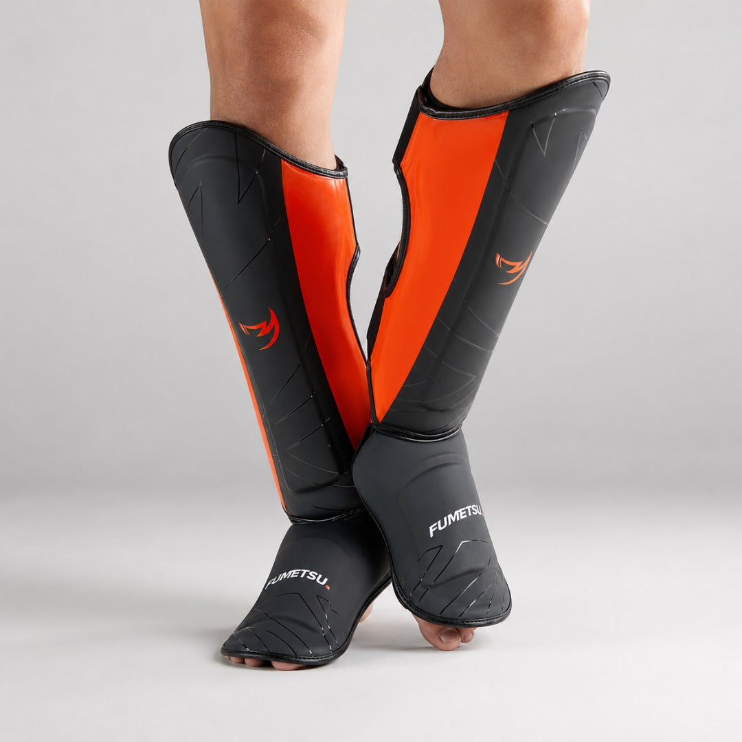 Icon Thai Shin Guards Black/Orange Lifestyle 3