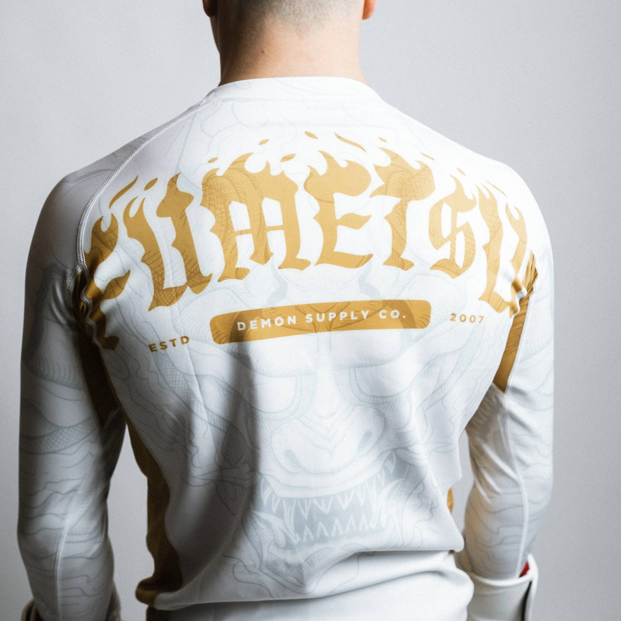 Oni Long Sleeve Rash Guard White/Gold/Grey