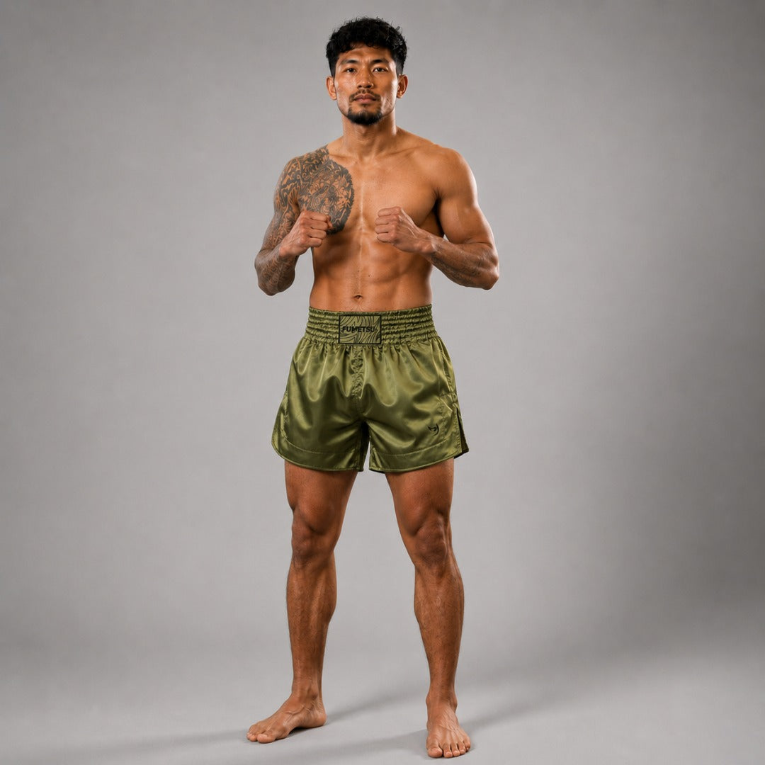 Khakifarbene Origins Muay-Thai-Shorts