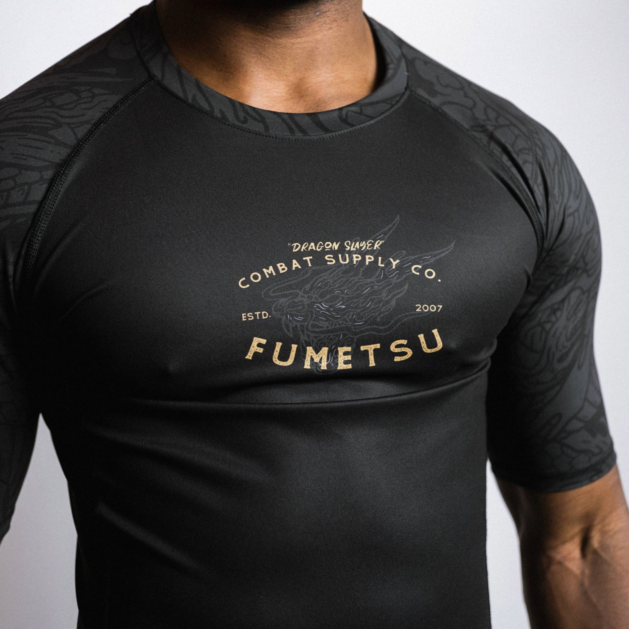 Slayer Rash Guard Dragon Slayer Short Sleeve Rash Guard Black/Gold from Fumetsu
