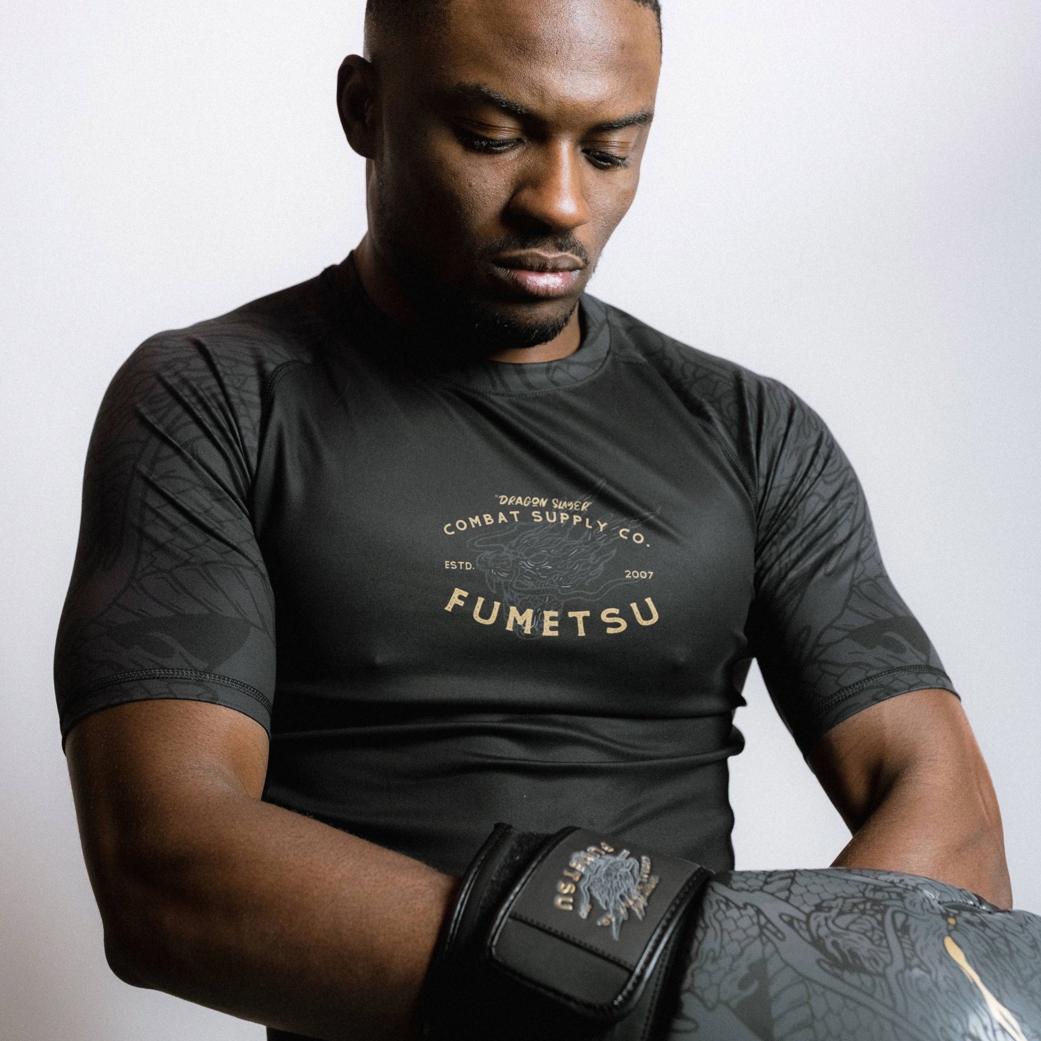 Short Sleeve Rash Guard Black Gold Close Up